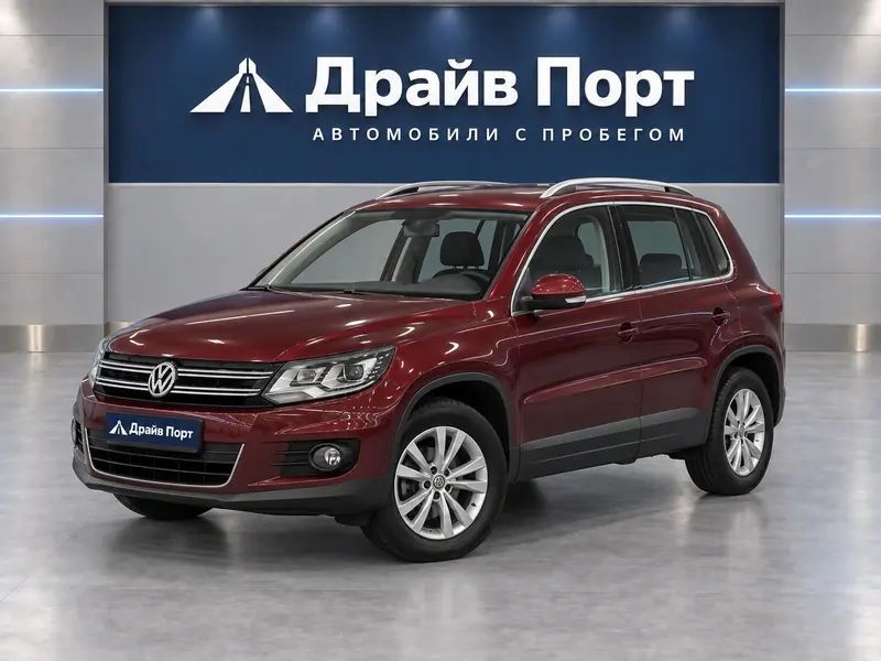 Volkswagen Tiguan 2016 — с пробегом, внедорожник, вишневый, вид спереди