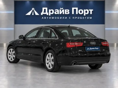 Audi A6 2011, вид сзади